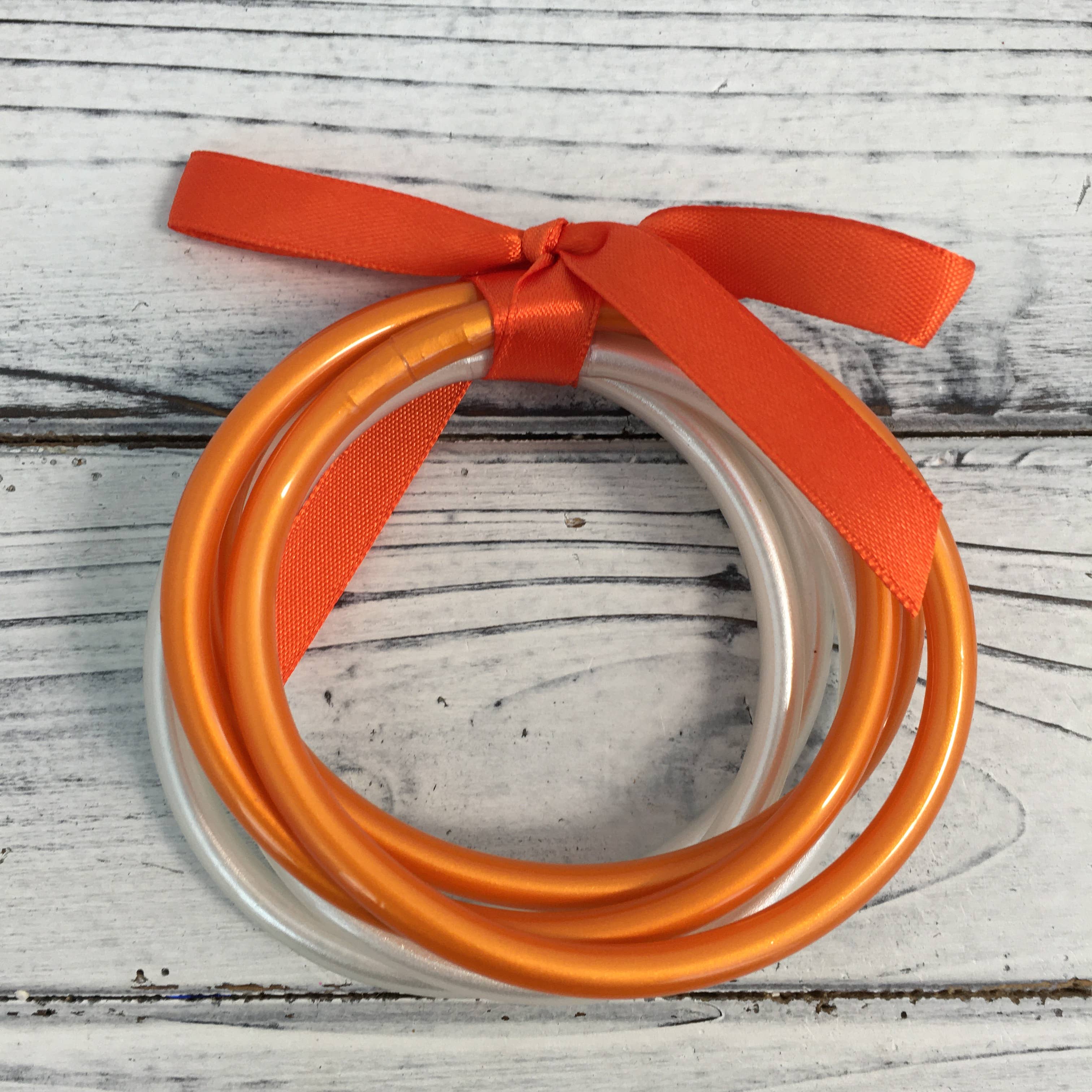 Orange and white bangle bracelet set 
