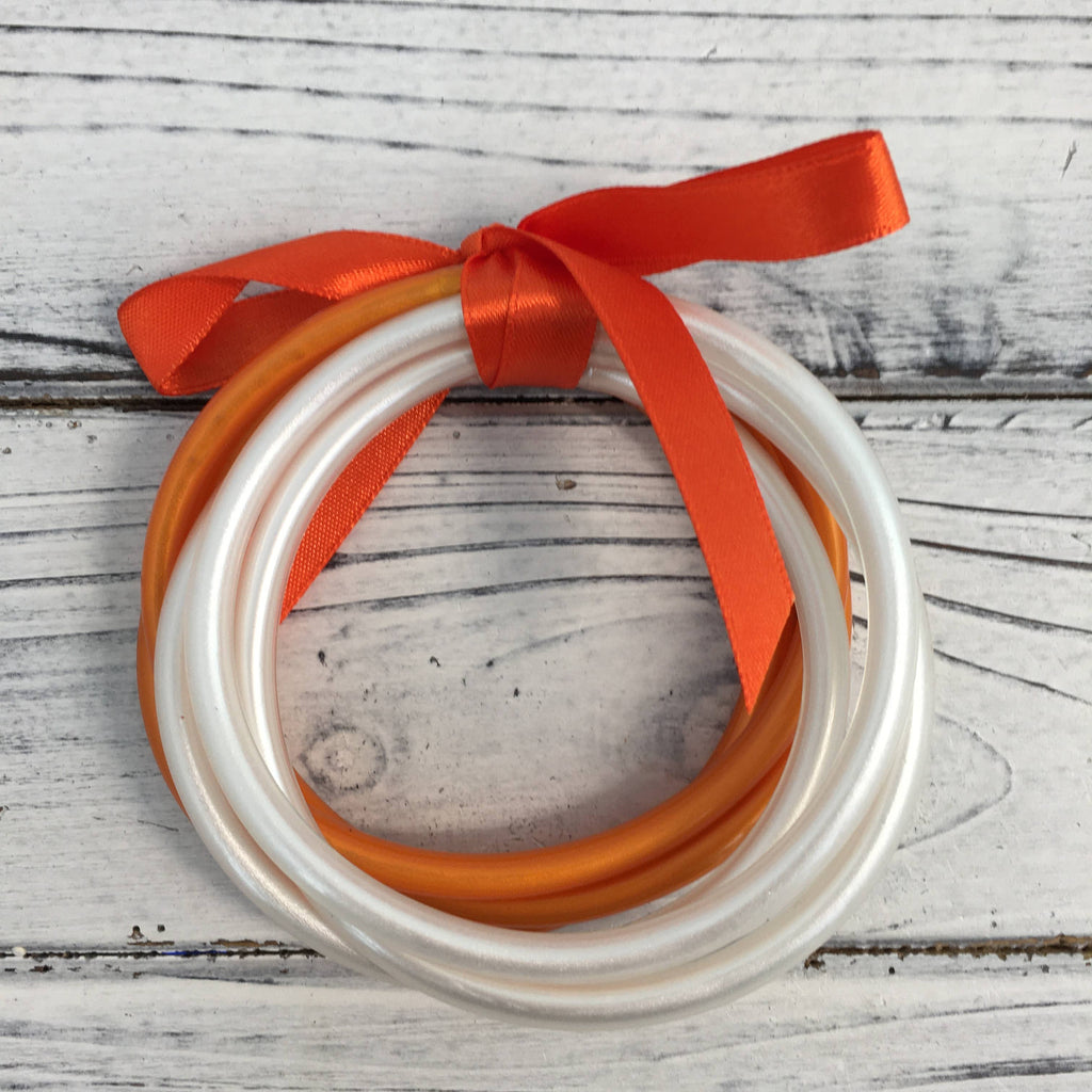 Orange and white bangle bracelet set 